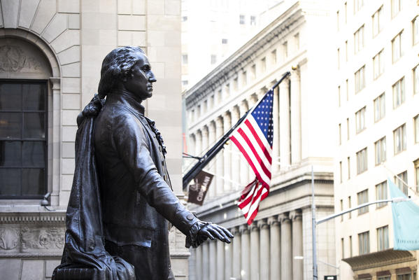 External view of Wall Street and New York Stock Exchange with George Washington statue. Manhattan, New York, USA