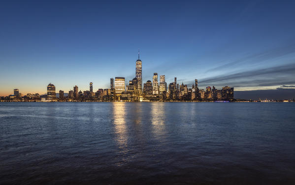 Southern Manhattan skyline, with Liberty Tower, from New Jersey coastline. New York, USA