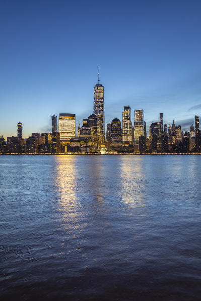 Southern Manhattan skyline, with Liberty Tower, from New Jersey coastline. New York, USA