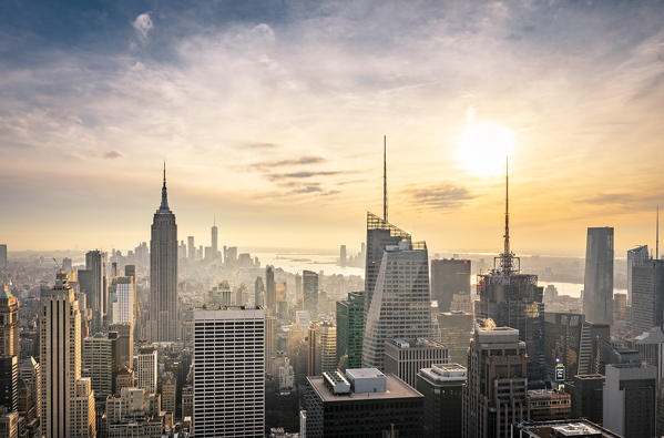 New York city Skyline with Empire State Building and Liberty Tower during sunset, from Top Of The Rock Building. 