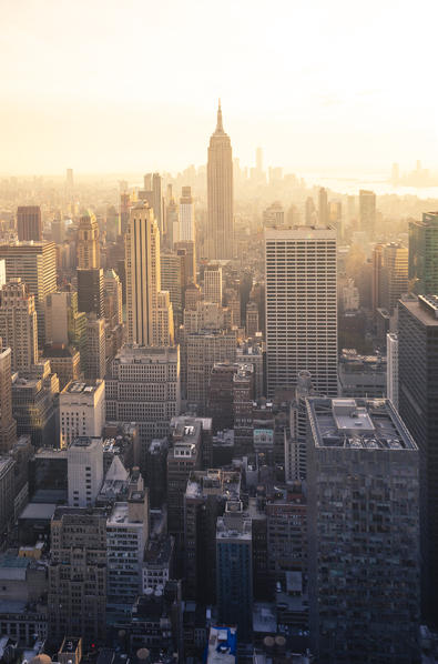 New York city Skyline with Empire State Building and Liberty Tower during sunset, from Top Of The Rock Building. 
