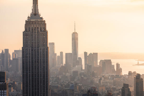 New York city Skyline with Empire State Building and Liberty Tower during sunset, from Top Of The Rock Building. 