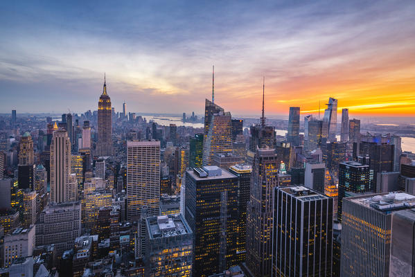 New York city Skyline with Empire State Building and Liberty Tower during sunset, from Top Of The Rock Building. 
