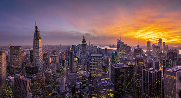 New York city Skyline with Empire State Building and Liberty Tower during sunset, from Top Of The Rock Building. 