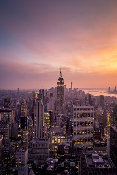 New York city Skyline with Empire State Building and Liberty Tower during sunset, from Top Of The Rock Building. 