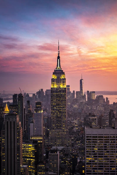 New York city Skyline with Empire State Building and Liberty Tower during sunset, from Top Of The Rock Building. 