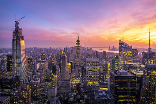 New York city Skyline with Empire State Building and Liberty Tower during sunset, from Top Of The Rock Building. 