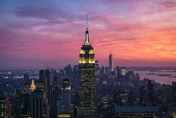 New York city Skyline with Empire State Building and Liberty Tower during sunset, from Top Of The Rock Building. 