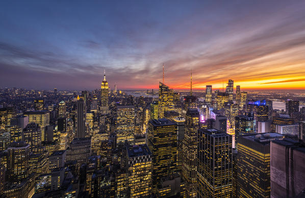 New York city Skyline with Empire State Building and Liberty Tower during sunset, from Top Of The Rock Building. 