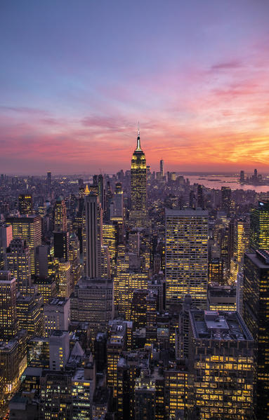 New York city Skyline with Empire State Building and Liberty Tower during sunset, from Top Of The Rock Building.  