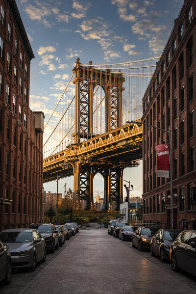 Manhattan bridge during sunset, a view from Dumbo district in Brooklin. New York City, USA.