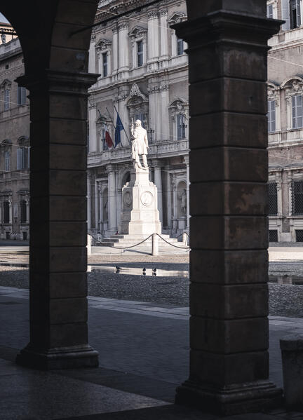 Piazza Roma, iconic square in Modena old town, with .Ciro Menotti statue Modena, Emilia Romagna, Italy
