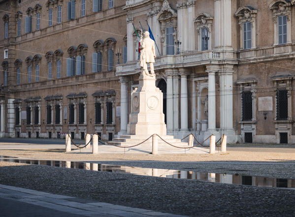 Piazza Roma, iconic square in Modena old town, with .Ciro Menotti statue Modena, Emilia Romagna, Italy