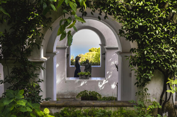 A girl walking in Villa San Michele garden, Capri island, Campania, Italy