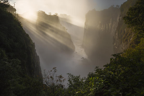 Victoria falls at sunrise, depicted from Zimbabwean side. Zimbabwe, Africa