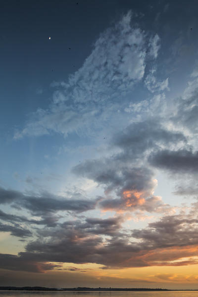 The colors of the sky above the rio negro at sunset. Amazonas; Amazonia; Manaus; Brazil, South America.