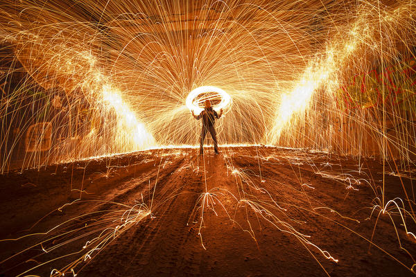 man in a tunnel during a steelwool, piacenza, emilia romagna. 