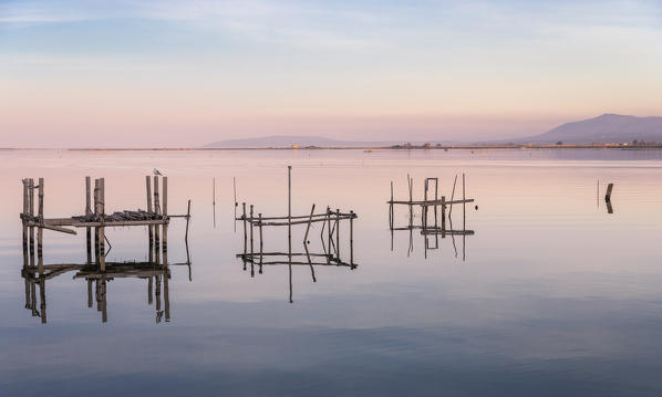 Lesina lake at sunset, Lesina village, Foggia district, Apulia, Italy
