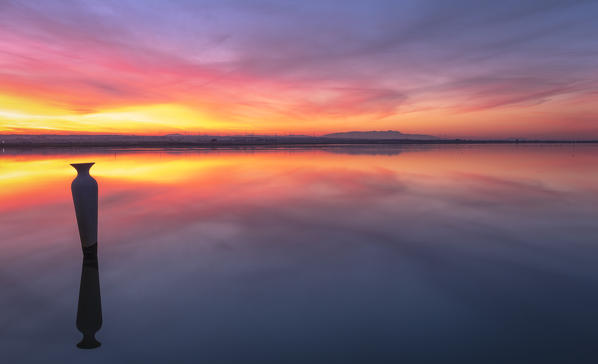 Lesina lake at sunset, Lesina village, Foggia district, Apulia, Italy