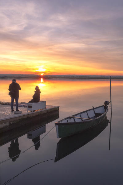 Lesina lake at sunset, Lesina village, Gargano National Park, foggia district, Apulia, Italy