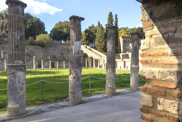 Arcade of Theaters or Gladiator Barracks in Ancient Pompei village, Naples district, Campania, Italy