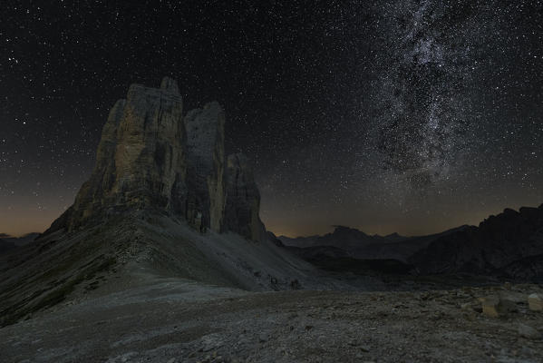 foto  - Europe, Italy, Dolomites, Veneto, Belluno. Milky way at Tre Cime di Lavaredo seen from Lavaredo fork