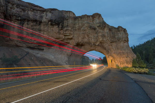 foto  - Lights of cars passing through Red Canyon Tunnel on scenic byway 12. Garfield County, Utah, USA: