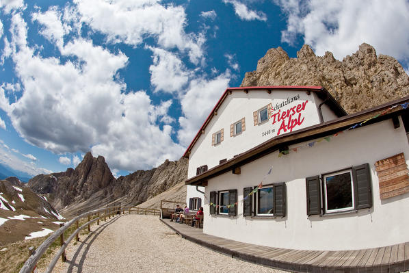 foto  - Tires Hut at Tires Pass, under the peaks of Cime Principe and Denti di Terrarossa. It is the starting point to access to the Catinaccio Rosengarten group from those coming from Alpe di Siusi and wanting to hike in the Sciliar-Catinaccio Natural Park - Dolomites, Trentino Alto Adige Italy Europe
