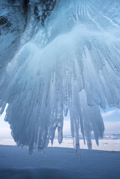 foto  - Ice stalactites in a cave at the shore of lake Bajkal, Irkutsk region, Siberia, Russia